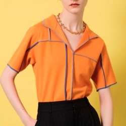 オレンジのステッチデザインシャツ