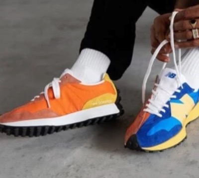New Balance（ニューバランス）オレンジxブルーのカラーブロックスニーカー