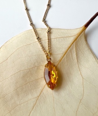 Handmade Accessory MUオレンジのトパーズネックレス