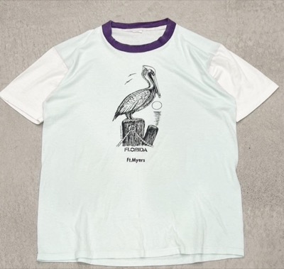 Florida T-shirtホワイトのペリカンプリントTシャツ