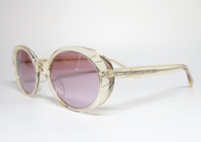 ゴールドxピンクのサングラス