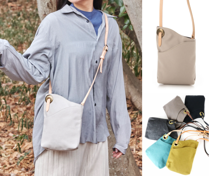 waji exhibit storeグレーのアシメサコッシュバッグ