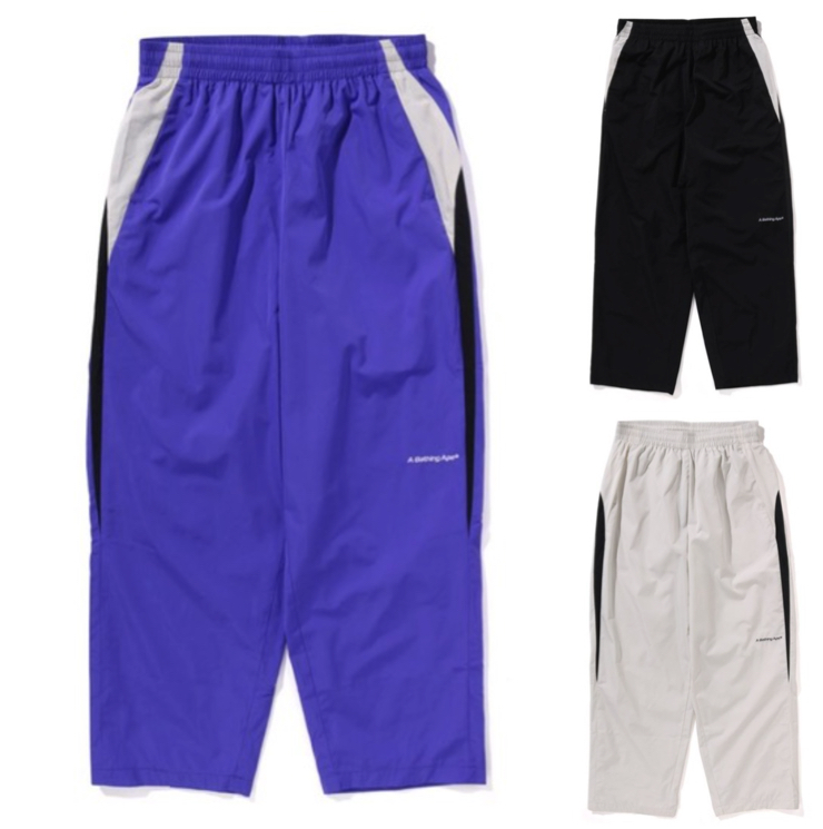 A BATHING APE（ア・ベイシング・エイプ）ブルーのトラックパンツ