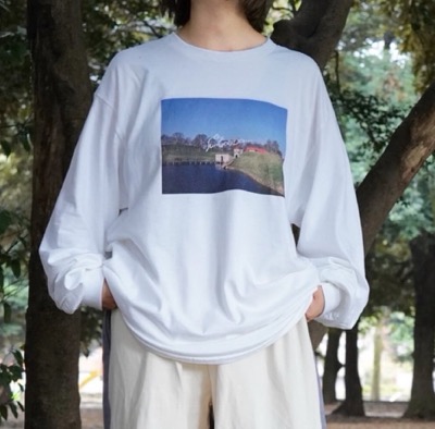 The Sun Goes Down（サンゴーズダウン）ホワイトのプリントTシャツ