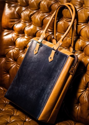 COCOMEISTER（ココマイスター）ブラックxブラウンのバッグ