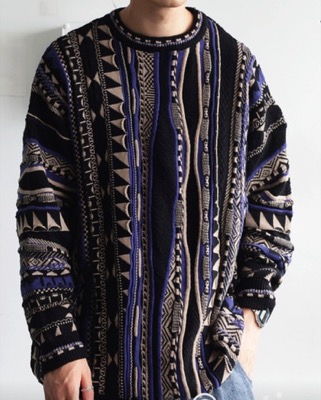 antiqua(アンティカ)ブラックxブルーの幾何学柄ジャガードニット